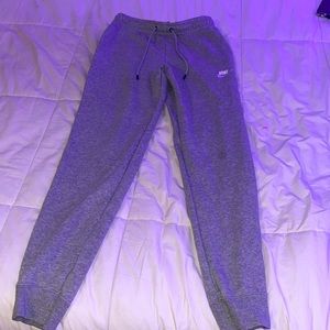 light grey nike joggers/ never worn. (size SMALL)
